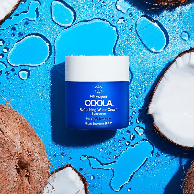 Full Spectrum 360º Refreshing Water Cream Organic Face Sunscreen SPF 50 with coconut water on a blue background