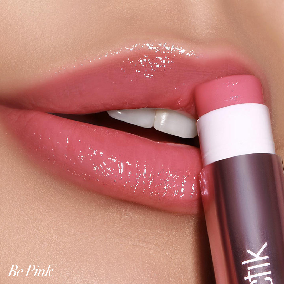 Close-up of lips wearing Girlactik Jello Gloss Balm in Be Pink, showing a glossy non-sticky finish.