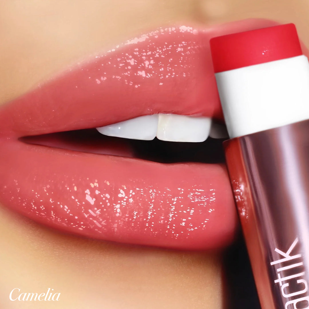 Close-up of lips wearing Girlactik Jello Gloss Balm in Camelia shade, showcasing glossy, hydrating finish.