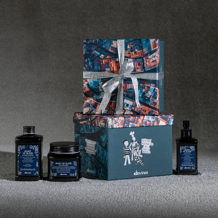 Davines Heart of Glass Gift Set with Silkening Shampoo, Rich Conditioner, and Sheer Glaze for enhancing blonde hair shine and strength.