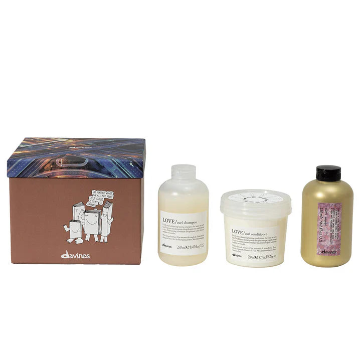 Davines Love Curl More Inside Gift Set with shampoo, conditioner, and curl building serum for enhancing curly and wavy hair.