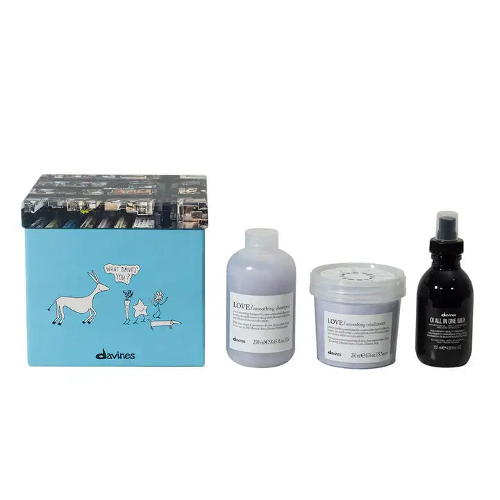Davines Love Smoothing Oi Gift Set with shampoo, conditioner, and OI All-in-One Milk for frizz control and smooth hair.