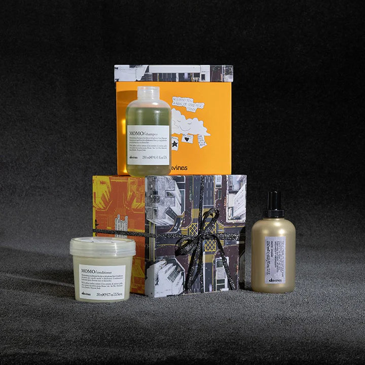 Davines Momo More Inside Gift Set with shampoo, conditioner, and blow dry primer for hydrating and protecting dry hair.