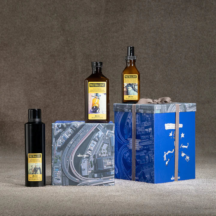Pasta Love Gift Set by Davines featuring Hair & Body Wash, Softening Shaving Gel, and After Shave Cream in elegant packaging.