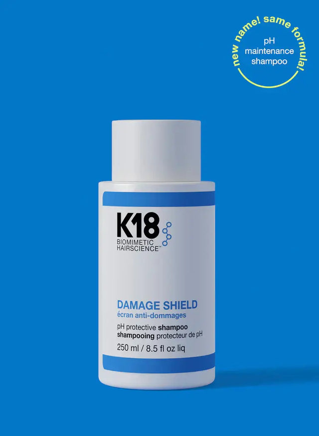 K18 DAMAGE SHIELD pH Protective Shampoo bottle, color-safe formula with K18PEPTIDE, protects hair health and boosts shine.