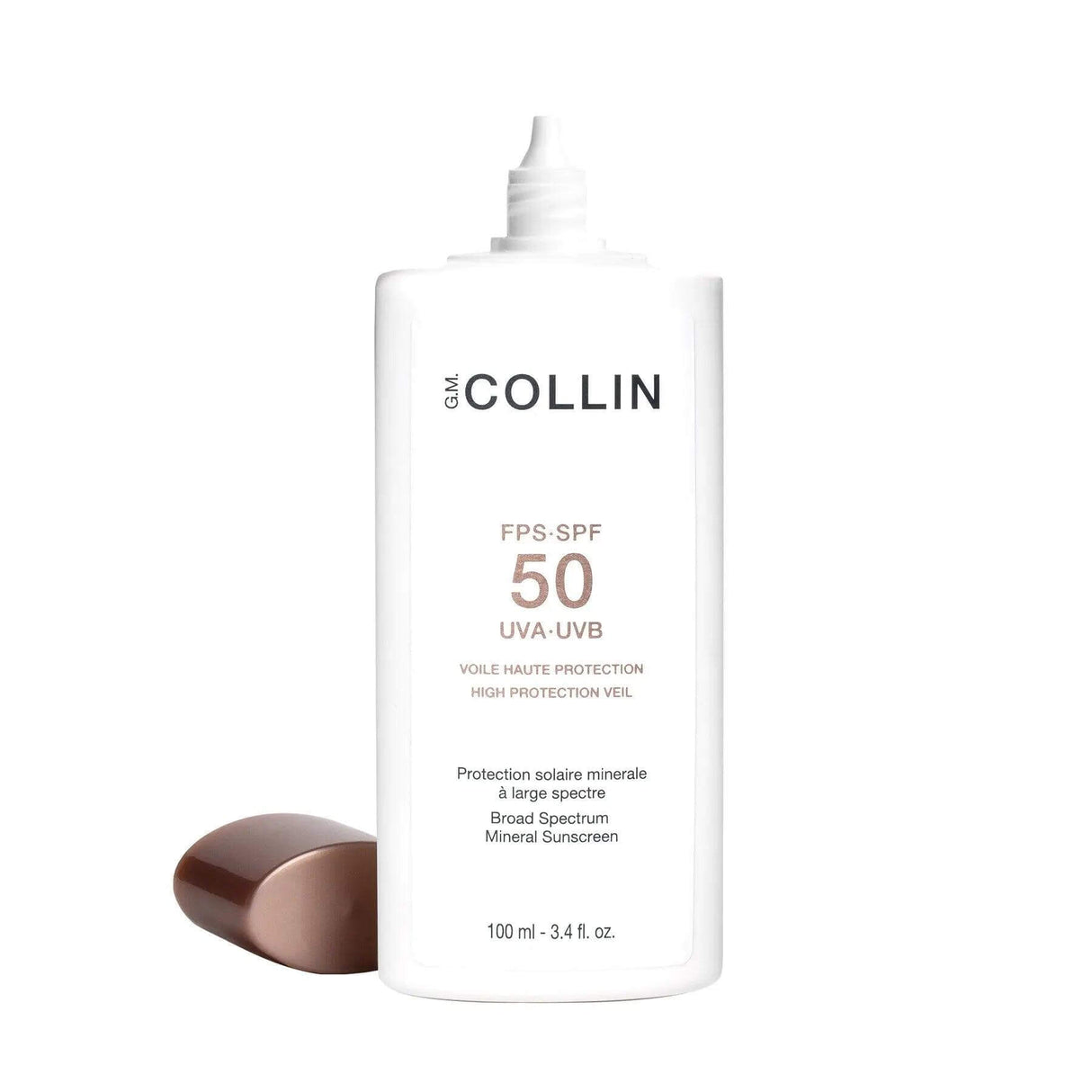 Sunscreen bottle labeled SPF 50 High Protection Veil with mineral filter, vitamin E, natural oils, ocean-friendly, and reef-safe formula.
