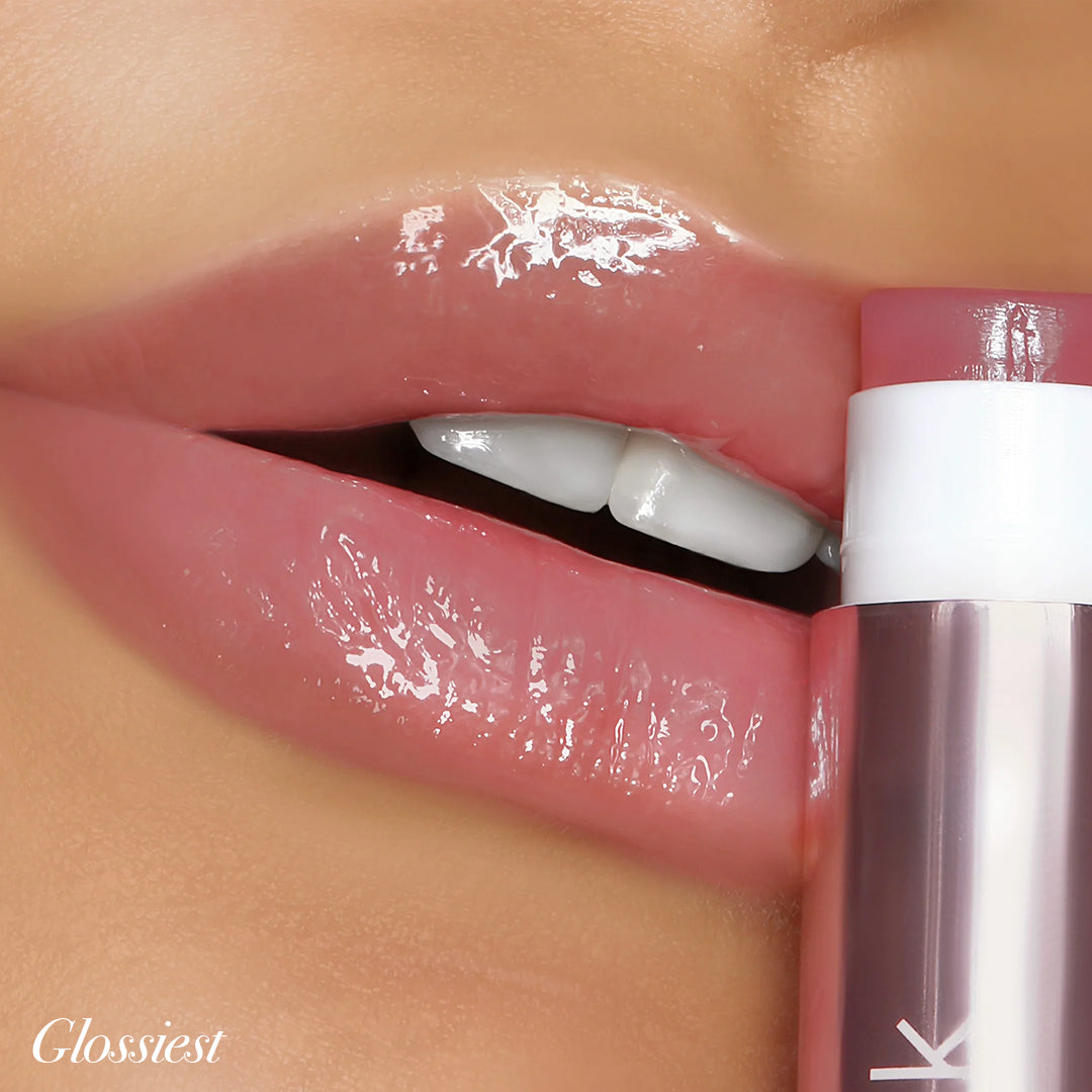 Close-up of lips with Girlactik Jello Gloss Balm, exhibiting a glossy, hydrating finish and a pink hue.