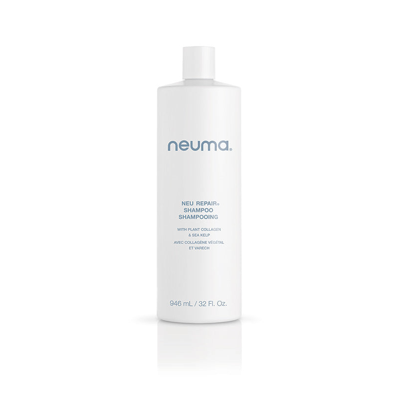 Neu Repair Shampoo bottle, 946 mL, for restoring and strengthening damaged hair with a gentle, sulfate-free formula and refreshing aroma.