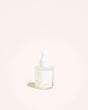 Hyaluronic Self Tanning Serum bottle with dropper on a light background.