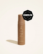 Self Tanning Mousse - Dark bottle with award badge, enriched with coconut oil, ideal for medium to dark skin, provides a rich golden glow.