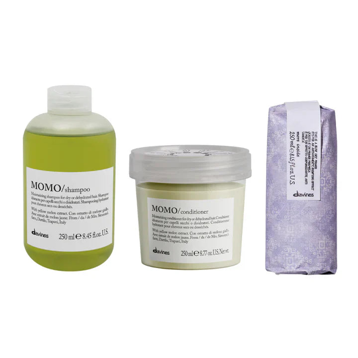 Davines Momo More Inside Gift Set with shampoo, conditioner, and primer for hydrating and protecting dry hair.
