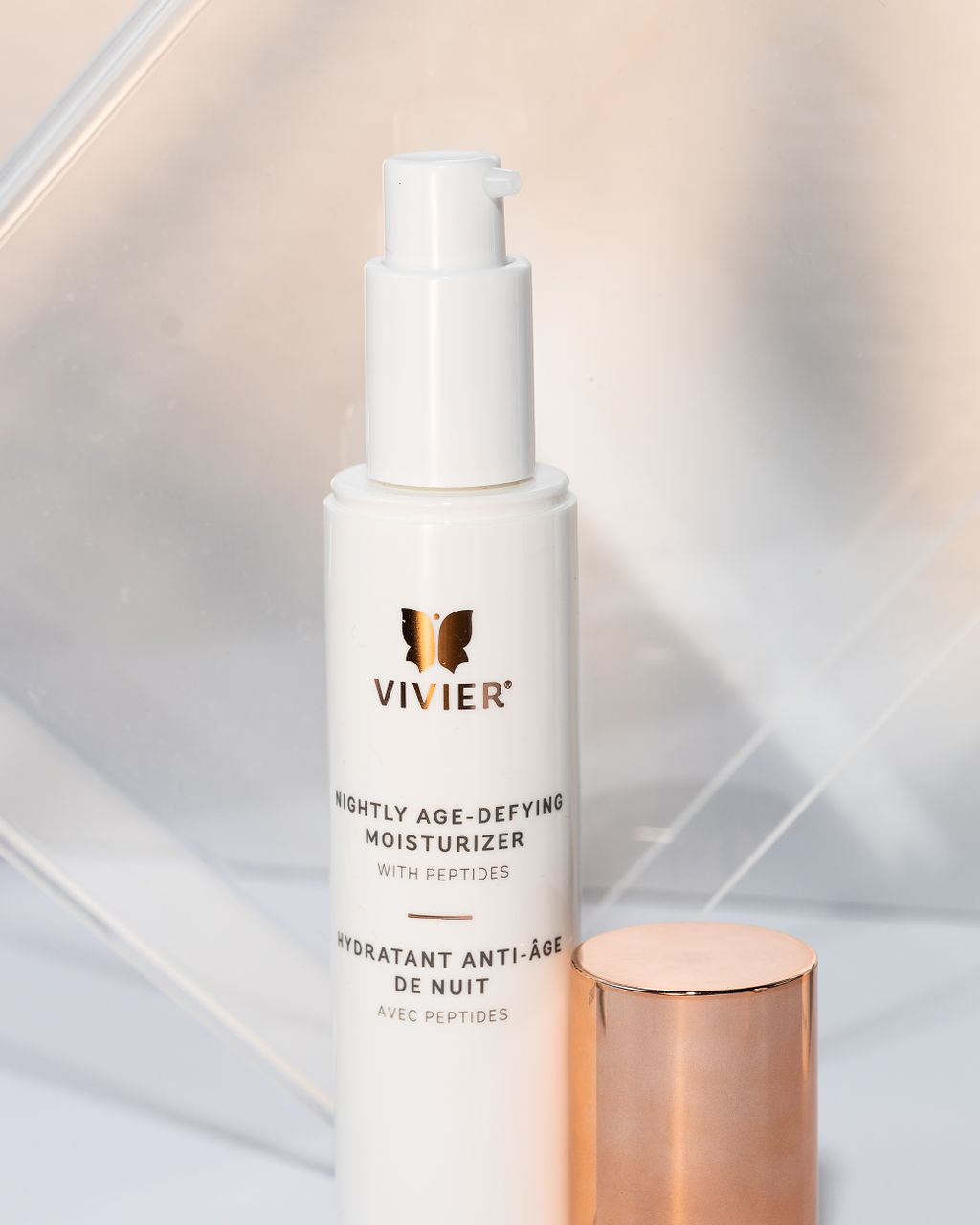 Vivier Nightly Age-Defying Moisturizer with peptides bottle, designed to enhance skin strength and moisture, ideal for normal to dry skin.