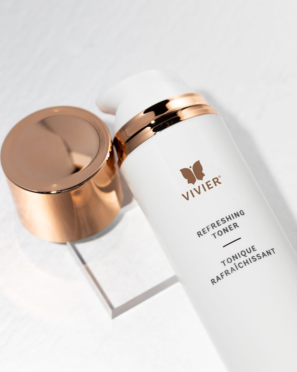 Vivier Refreshing Toner bottle with copper cap, designed for deep cleansing and exfoliation with Witch Hazel and Vitamin C.