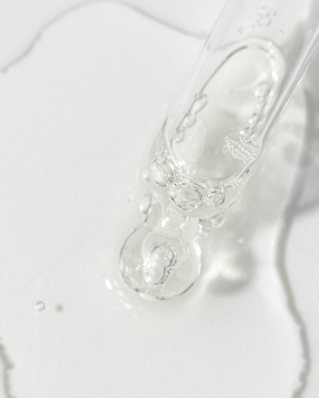 Close-up of Vivier Kine-C serum with Vitamin C and peptides, showcasing its lightweight, oil-free, and hydrating formula.