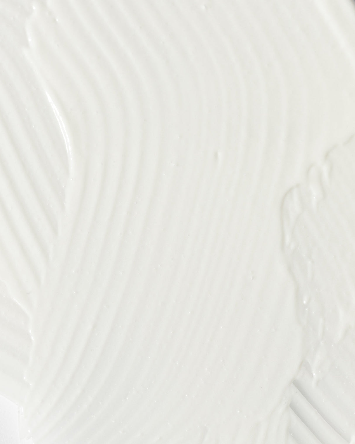 Close-up texture of Vivier Redness Solution Complex, highlighting its soothing and nourishing cream formula.