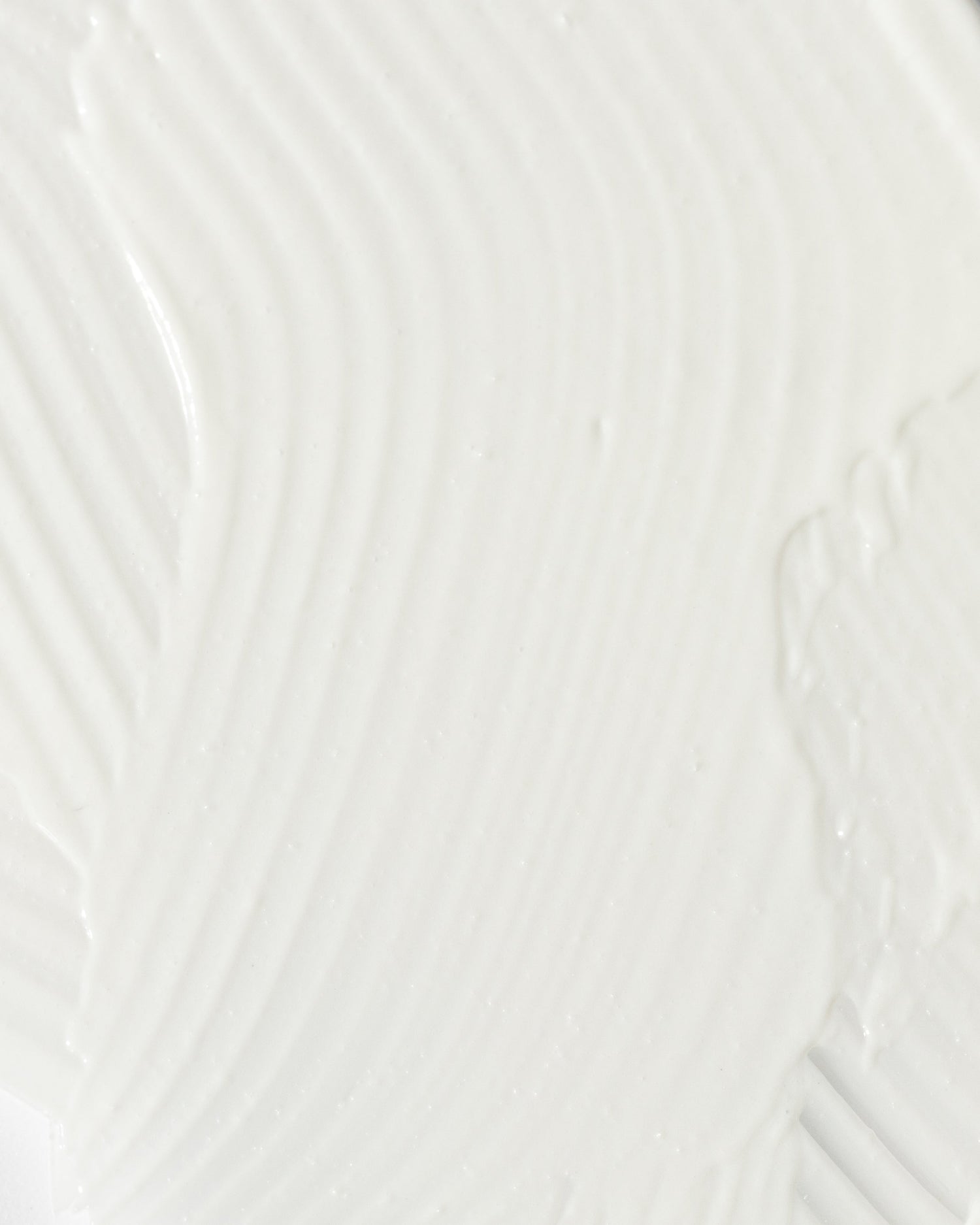 Close-up texture of Vivier Redness Solution Complex, highlighting its soothing and nourishing cream formula.
