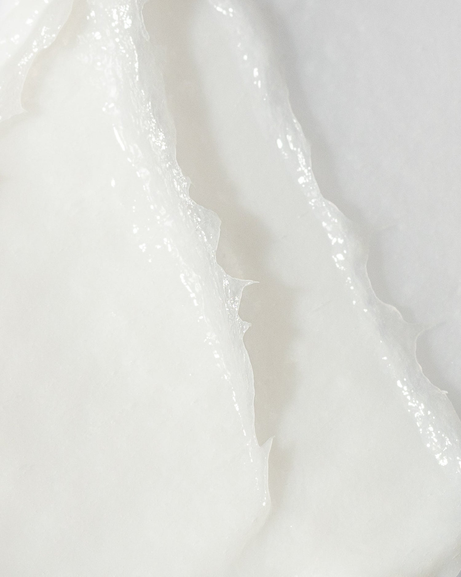 Close-up texture of Vivier Skin Brightening Cream, showcasing rich, smooth consistency for even skin tone and texture.