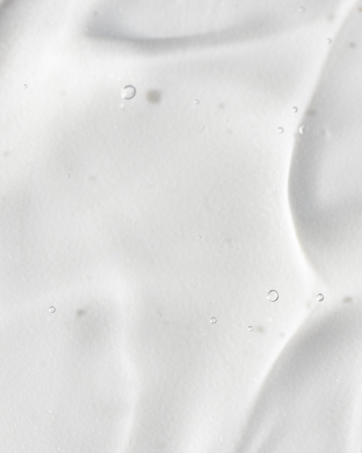 Close-up of Vivier Ultimage™ gel texture showcasing smooth, hydrating formula with hyaluronic acid for youthful skin.