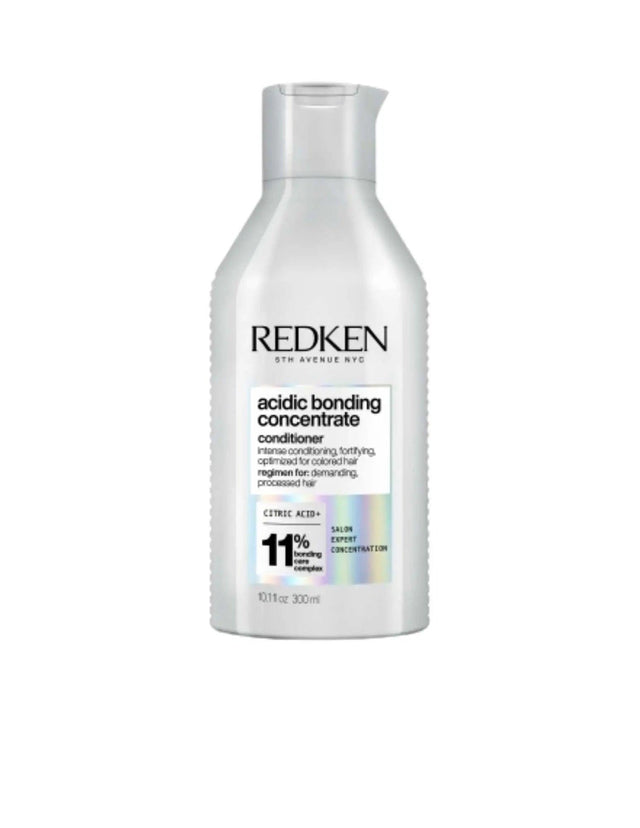Redken Acidic Bonding Concentrate Conditioner 300ml bottle for damaged hair repair and pH balance, suitable for all hair types and textures.