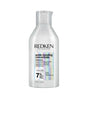Redken Acidic Bonding Concentrate Shampoo bottle for damaged hair repair and strengthening.