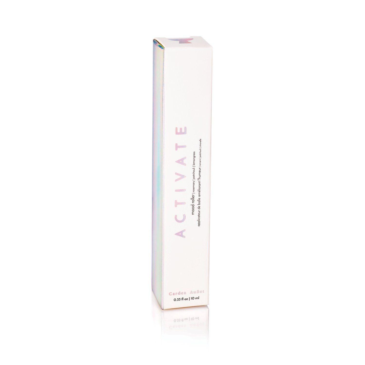Activate Mood Roller packaging featuring natural aromatherapy blend with patchouli, lemongrass, and rosemary for energy and focus.
