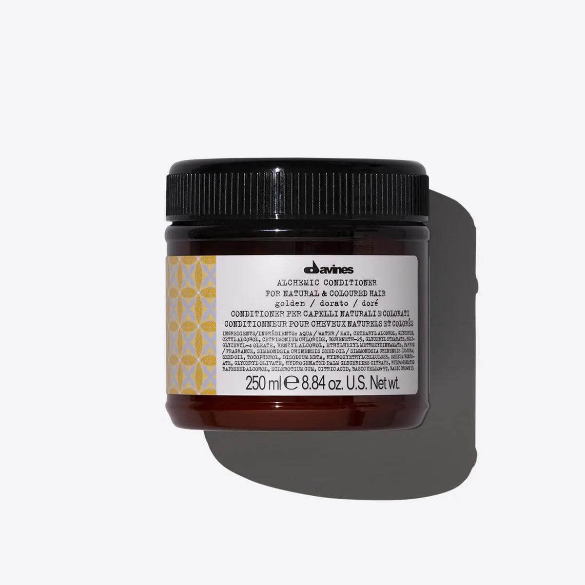 Alchemic Conditioner Golden 250ml for enhancing and brightening blonde hair tones, shown in a brown jar with label.