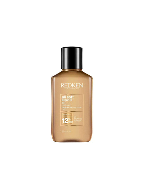 Redken All Soft Argan-6 Oil bottle for nourishing and softening dry, brittle hair, suitable for all hair types and textures.