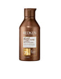 Redken All Soft Mega Curls Conditioner bottle for hydrating and defining curly hair, ideal for taming dryness and frizz.