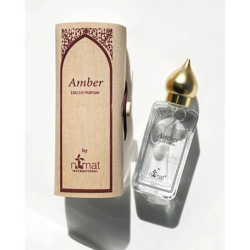 Amber Eau De Parfum Spray 50ml with eco-friendly packaging, captures a unique fragrance blend by Nemat.