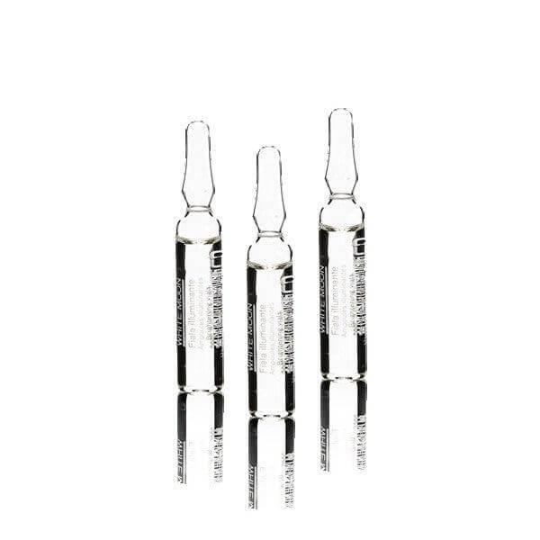 Three transparent vials of White Moon Brightening serum for dull, pigmented skin with hydrating plant-based ingredients.
