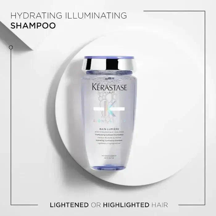 Bottle of Kérastase Bain Lumière Blond Absolu shampoo for lightened and highlighted hair, hydrates and enhances shine.