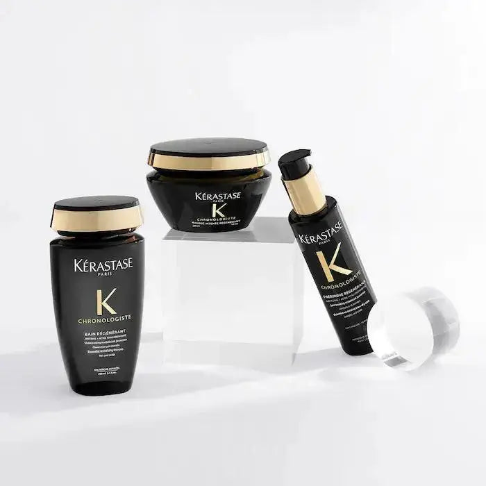 Kérastase Chronologiste Bain Régénérant shampoo display with luxury hair care products for rejuvenating and cleansing.