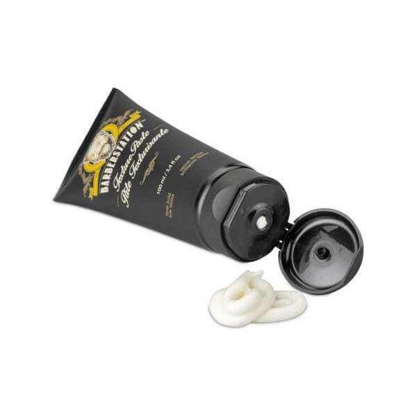 Barberstation Texture Paste tube with open cap and cream detail, ideal for strong hold and matte finish.