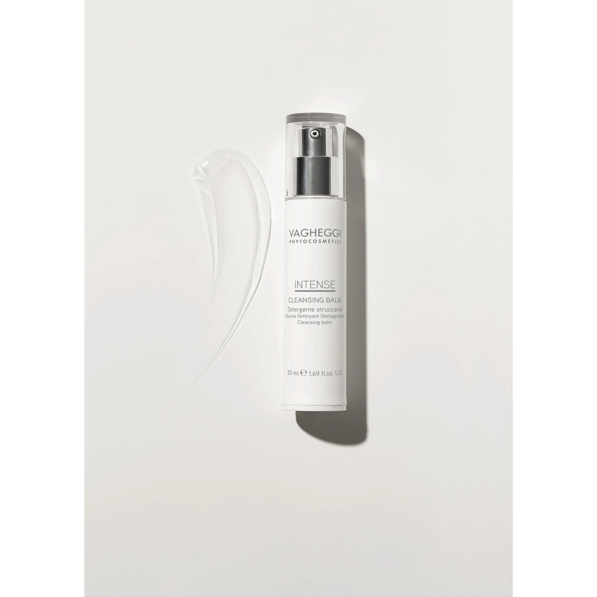 Luxurious cleansing balm with shea butter, coconut oil, and tilleulum flower extract in sleek packaging on a light background.