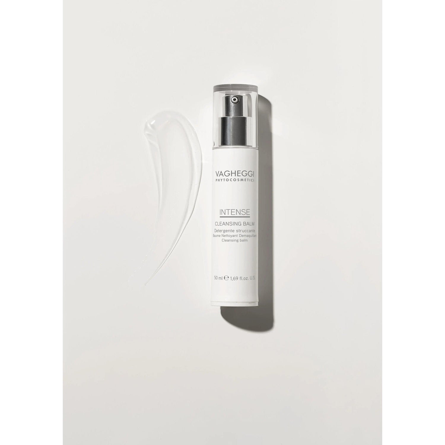 Luxurious cleansing balm with shea butter, coconut oil, and tilleulum flower extract in sleek packaging on a light background.