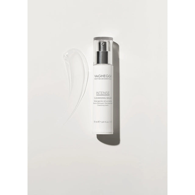 Luxurious cleansing balm with shea butter, coconut oil, and tilleulum flower extract in sleek packaging on a light background.