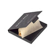 Malu Wilz blotting papers, pack of 100, for oil absorption and shine reduction, in sleek packaging.