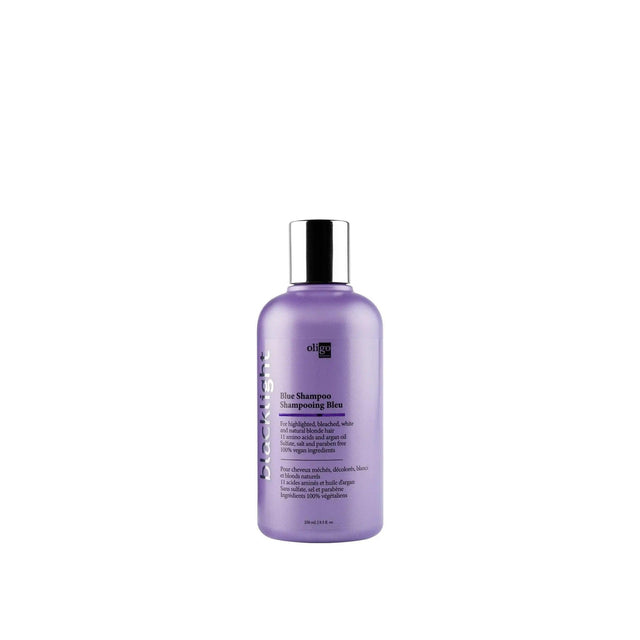 Blacklight Blue Shampoo for blonde hair, reduces brassiness, enhances shine with amino acids and argan oil, 250ml bottle.