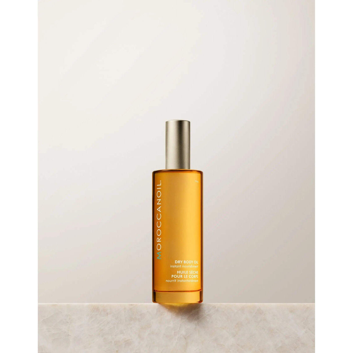 Moroccanoil Body Dry Body Oil with hydrating argan oil, olive and avocado oils. Paraben-free, lightweight skincare product.