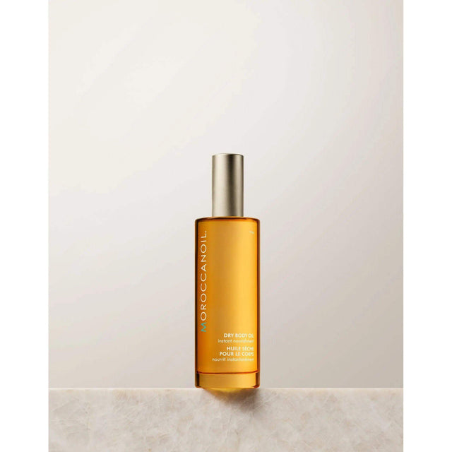 Moroccanoil Body Dry Body Oil with hydrating argan oil, olive and avocado oils. Paraben-free, lightweight skincare product.