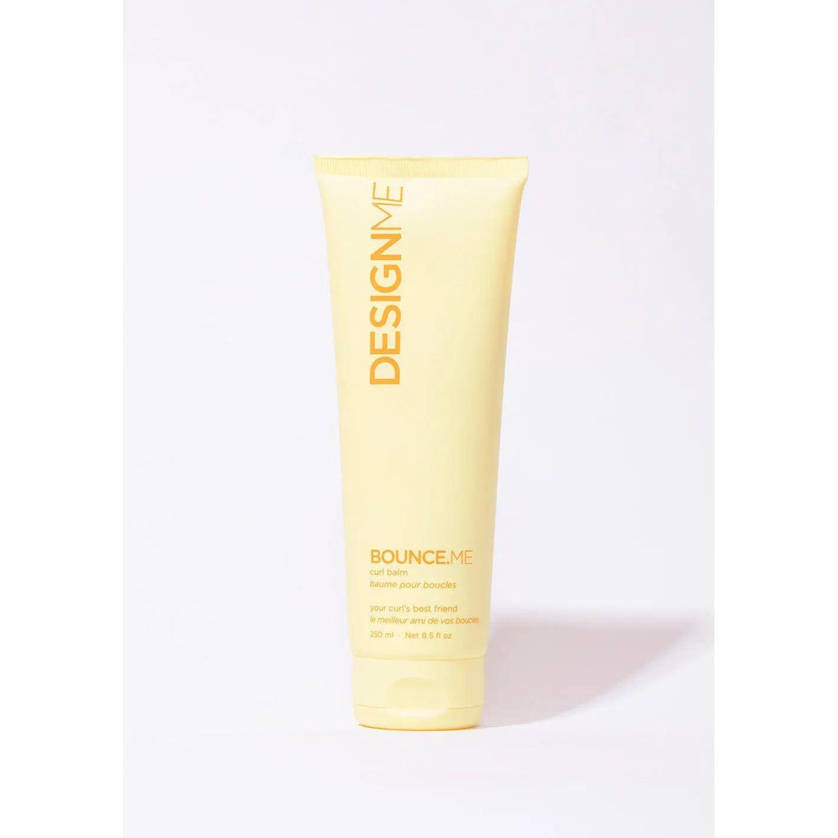Bounce.Me Curl Balm tube with argan oil for non-crunchy, bouncy curls and buildable hold against a white background.