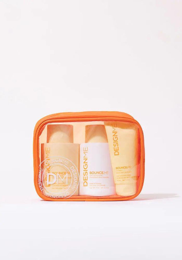BOUNCE.ME Curl Glitz Kit for defined curls in orange travel case, includes shampoo, conditioner, and curl balm for 2A to 4C hair types.