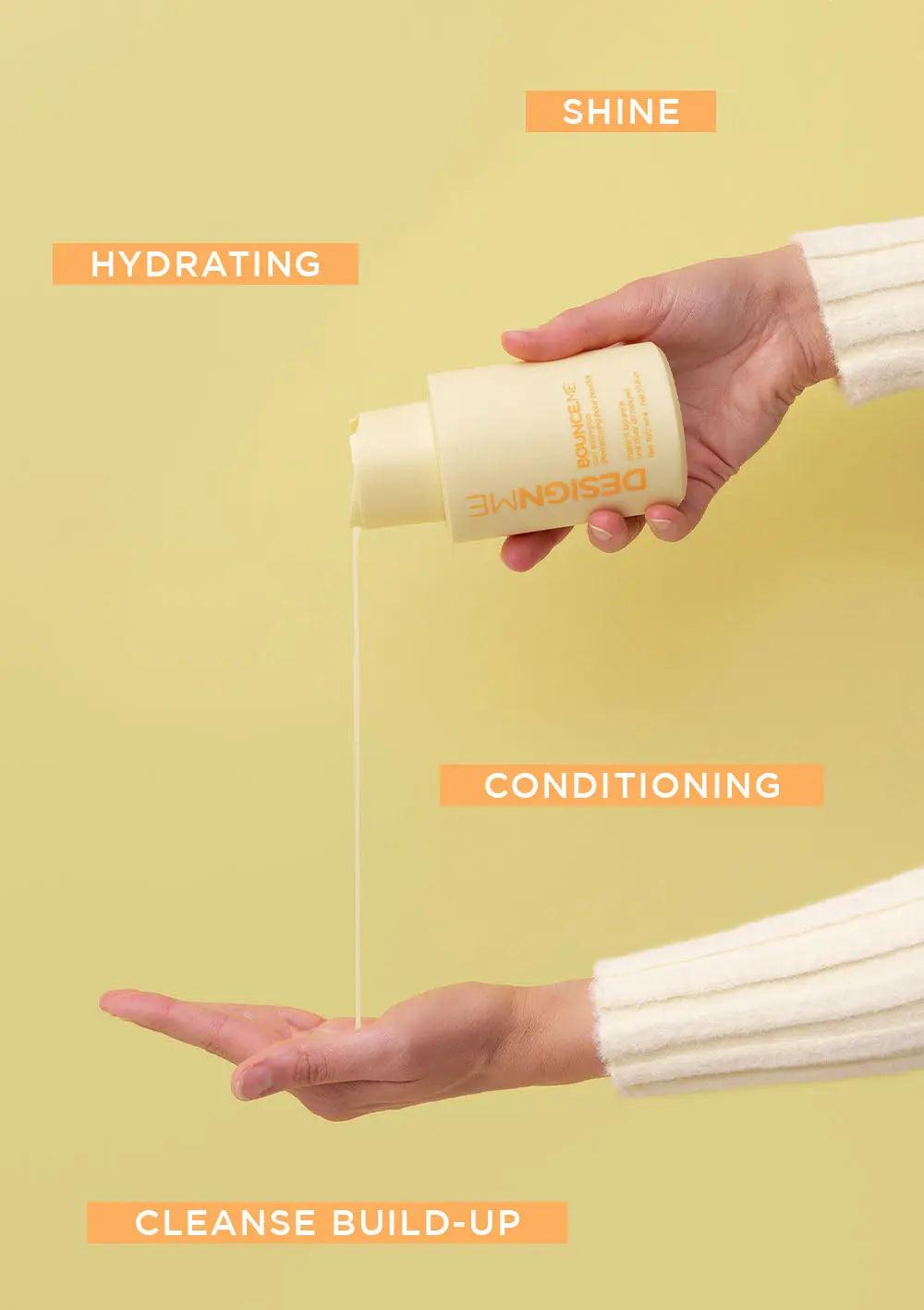 Person pouring DESIGNME hydrating curl shampoo with highlights of shine, conditioning, and cleanse build-up benefits.