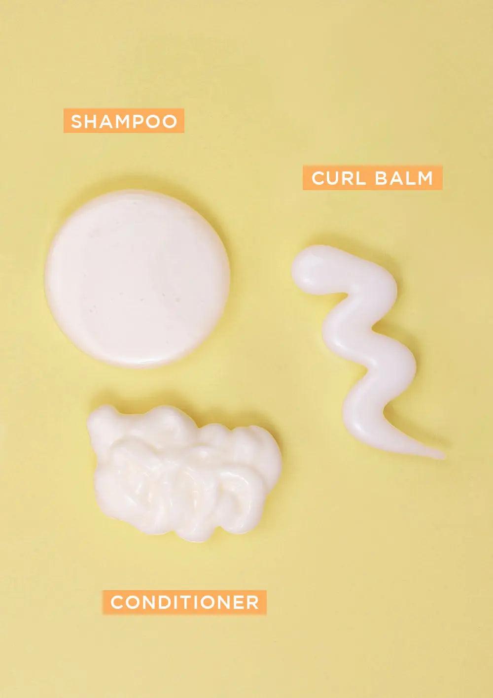 BOUNCE.ME Curl Glitz Kit with shampoo, conditioner, and curl balm samples for wavy to coily hair on a yellow background.
