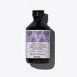 Davines Calming Shampoo bottle for soothing and hydrating sensitive scalps, featuring a natural, sulfate-free formula.