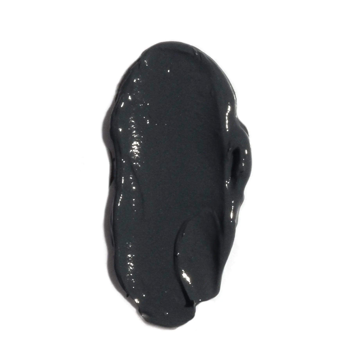 Charcoal mask cream swatch for sensitive skin, reduces discomfort and redness, ideal for professional care, smooth texture.