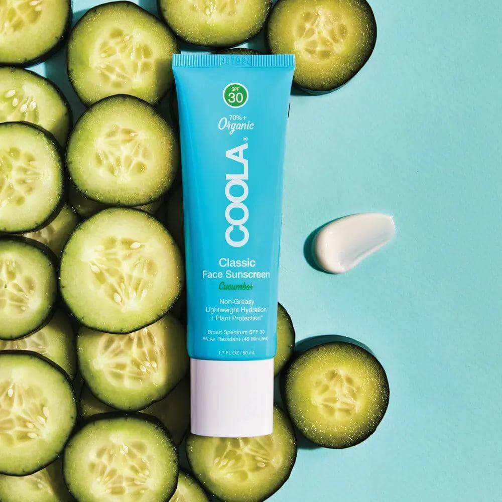 Classic Face Organic Sunscreen Lotion SPF 30 - Cucumber with sliced cucumbers and lotion smear, offering UVA/UVB protection.