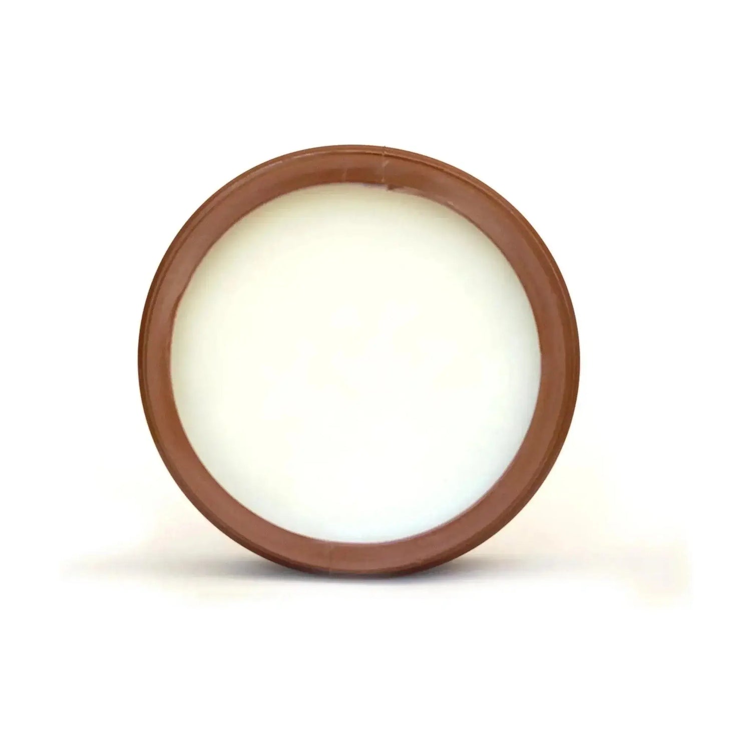 Top view of coconut cream container with brown lid, showing smooth texture of the tan accelerating cream, ideal for fair skin.
