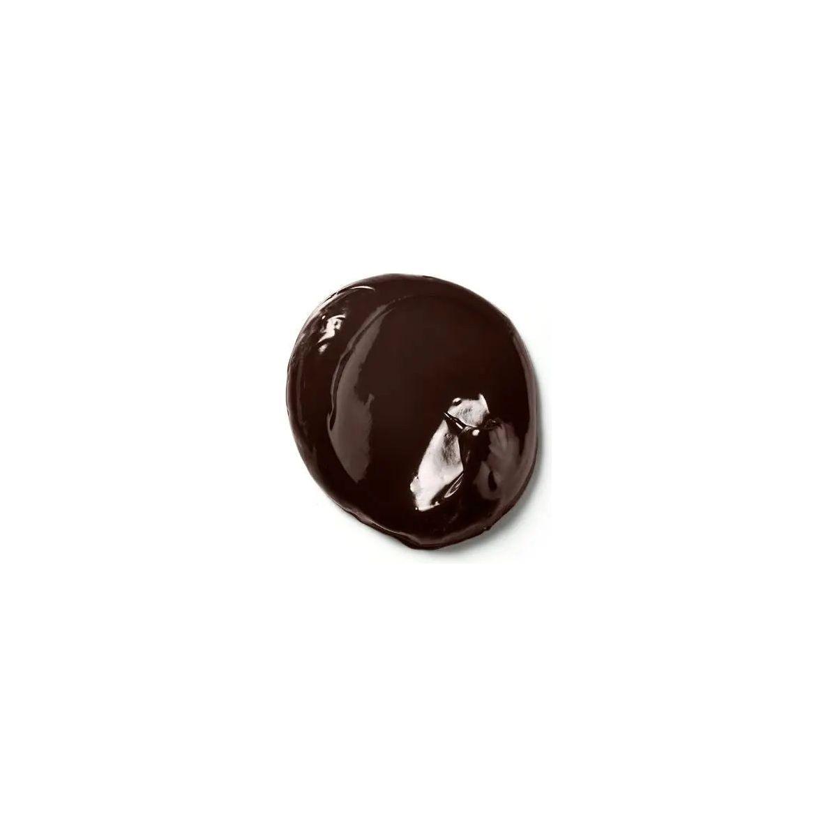 Rich brown hair color depositing mask swatch with glossy argan oil shine for vibrant and conditioned hair.