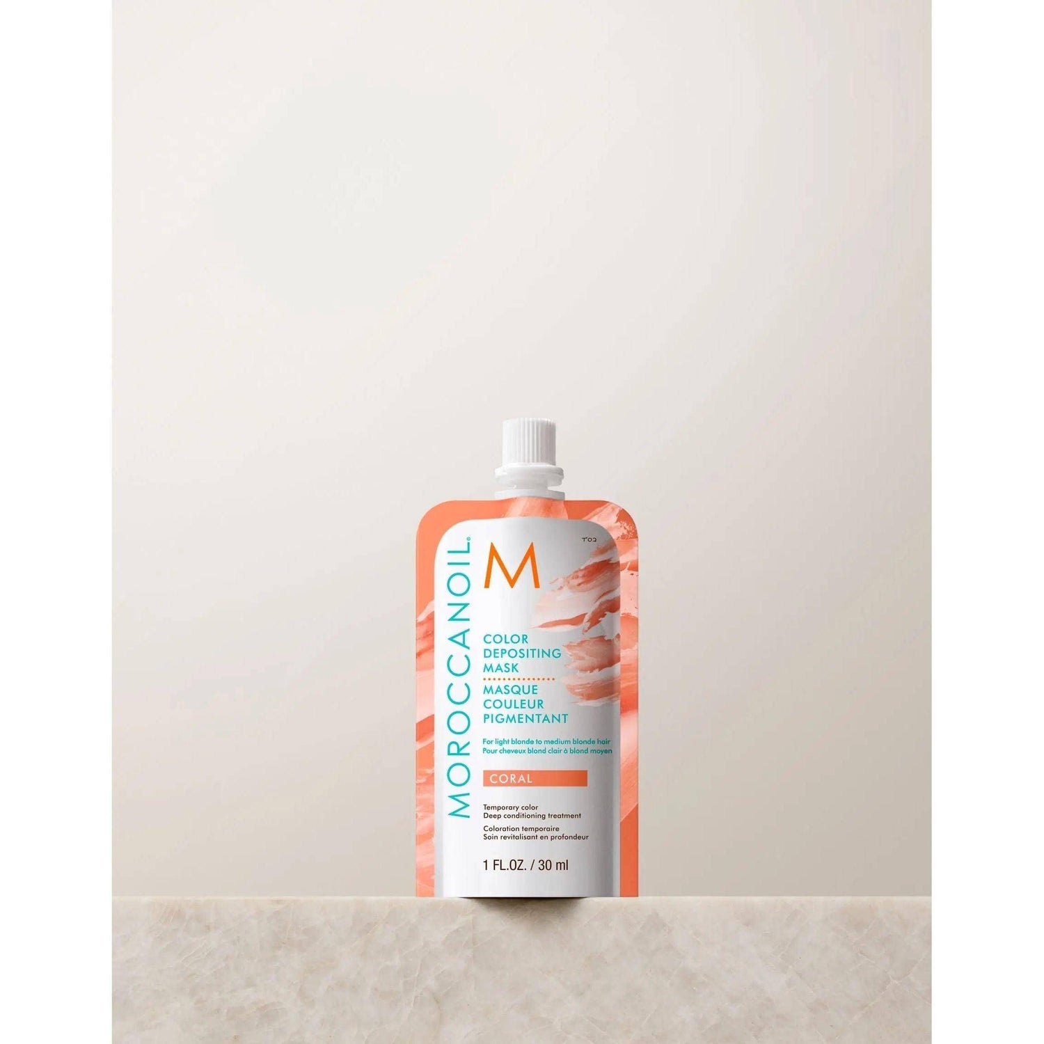 Moroccanoil Color Depositing Mask 30ml with argan oil for shine and color refresh, perfect for reducing brassiness between salon visits.
